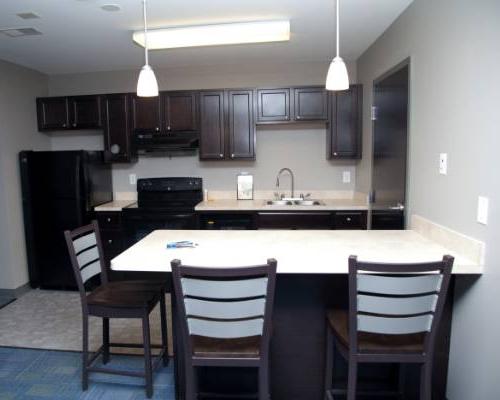 kitchen with breakfast bar and chairs